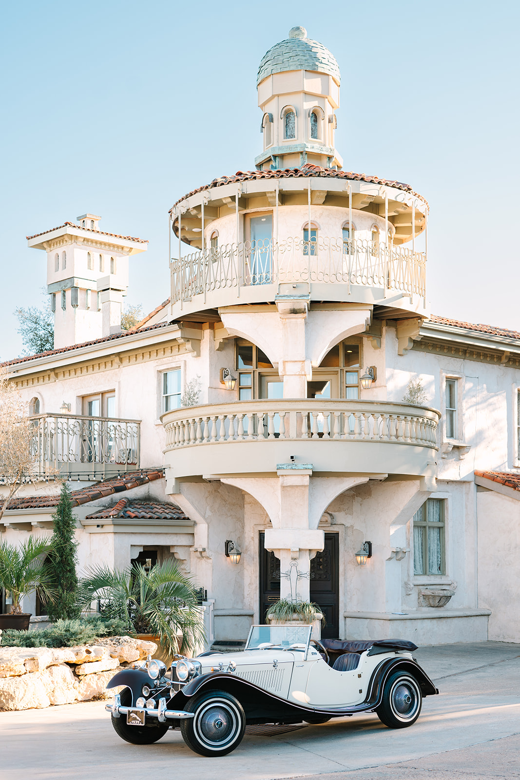 Italian Architecture at Villa Antonia wedding venue in Austin Texas with vintage car